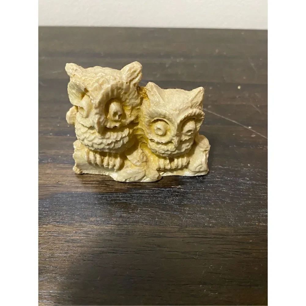 2 handcarved stone owls